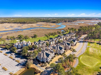 Get ready to fall in love with this luxurious townhome and the on Rivers Edge Golf Club in North Carolina - for sale on GolfHomes.com, golf home, golf lot