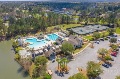 Discover refined Southern living in this nearly new home located on Savannah Quarters Country Club in Georgia - for sale on GolfHomes.com, golf home, golf lot