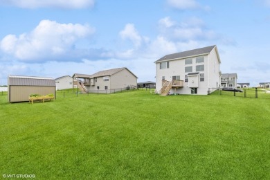 Welcome to this stunning home, situated on large corner lot on Ballard Golf and Country Club in Iowa - for sale on GolfHomes.com, golf home, golf lot