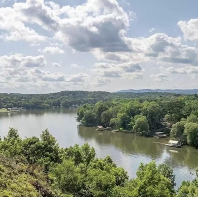 Spectacular 2-bed, 2-bath residence with gorgeous lake and on Diamondhead Golf and Country Club in Arkansas - for sale on GolfHomes.com, golf home, golf lot