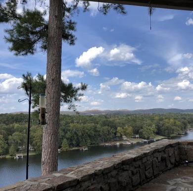 Spectacular 2-bed, 2-bath residence with gorgeous lake and on Diamondhead Golf and Country Club in Arkansas - for sale on GolfHomes.com, golf home, golf lot