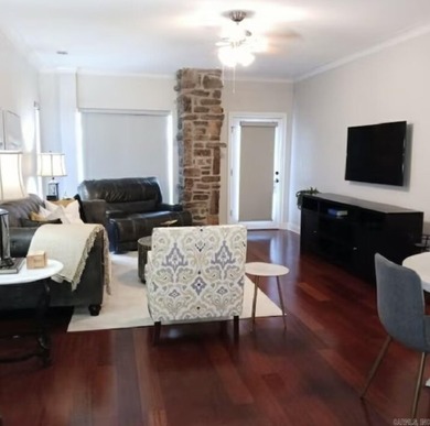 Spectacular 2-bed, 2-bath residence with gorgeous lake and on Diamondhead Golf and Country Club in Arkansas - for sale on GolfHomes.com, golf home, golf lot