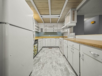 This Cooper-built 2bed-2bath renovation highlights the solid on Cortez Golf Course in Arkansas - for sale on GolfHomes.com, golf home, golf lot