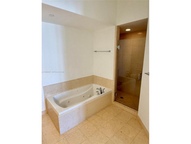 Beautifully appointed 3-bedroom, 3-bath Tower Suite in Turnberry on Turnberry Isle Resort and Club in Florida - for sale on GolfHomes.com, golf home, golf lot