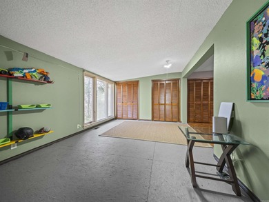 This Cooper-built 2bed-2bath renovation highlights the solid on Cortez Golf Course in Arkansas - for sale on GolfHomes.com, golf home, golf lot