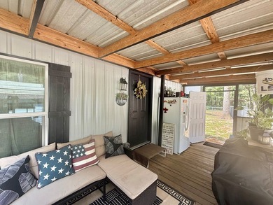 This stunning 2-bedroom, 2-bath partially furnished manufactured on Pendleton Harbor in Texas - for sale on GolfHomes.com, golf home, golf lot