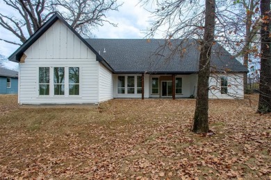 Rewrite using 1000 characters or less: Seller offering $5,000 in on Cedar Creek Country Club in Texas - for sale on GolfHomes.com, golf home, golf lot