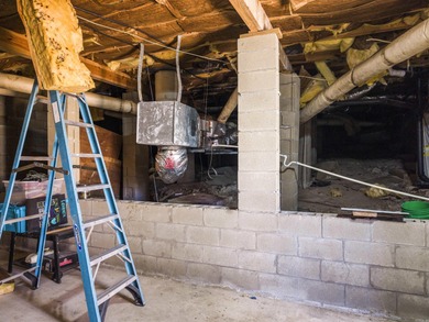 This Cooper-built 2bed-2bath renovation highlights the solid on Cortez Golf Course in Arkansas - for sale on GolfHomes.com, golf home, golf lot