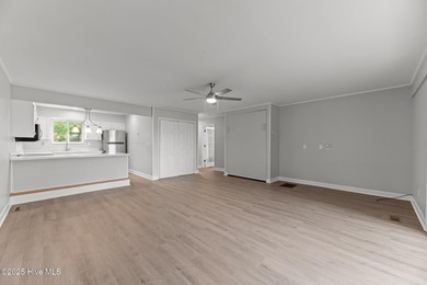 Escape to your own one-bedroom condo in a peaceful resort-style on Harbour Point Golf Club in North Carolina - for sale on GolfHomes.com, golf home, golf lot