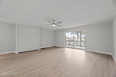 Escape to your own one-bedroom condo in a peaceful resort-style on Harbour Point Golf Club in North Carolina - for sale on GolfHomes.com, golf home, golf lot