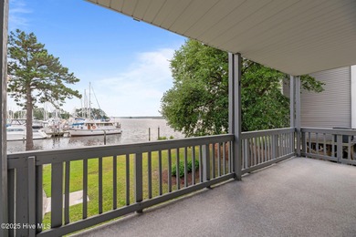 Escape to your own one-bedroom condo in a peaceful resort-style on Harbour Point Golf Club in North Carolina - for sale on GolfHomes.com, golf home, golf lot