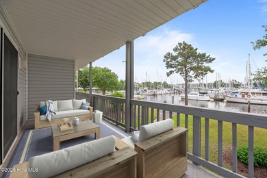 Escape to your own one-bedroom condo in a peaceful resort-style on Harbour Point Golf Club in North Carolina - for sale on GolfHomes.com, golf home, golf lot