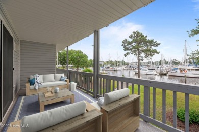 Escape to your own one-bedroom condo in a peaceful resort-style on Harbour Point Golf Club in North Carolina - for sale on GolfHomes.com, golf home, golf lot