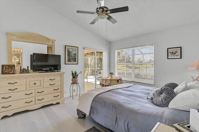 Three bedrooms, a private pool, and lake and golf course on Peridia Golf and Country Club in Florida - for sale on GolfHomes.com, golf home, golf lot