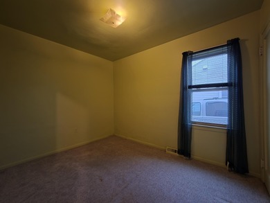 Located on a quiet street on Pontiac's South Side, this on The Links At Crystal Lake in Michigan - for sale on GolfHomes.com, golf home, golf lot