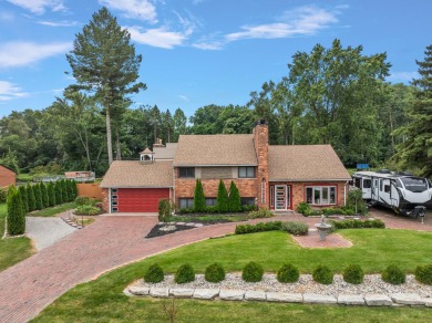 Don't miss this stunning Brick Bi-Level Home located off of on Western Golf and Country Club in Michigan - for sale on GolfHomes.com, golf home, golf lot