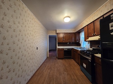 Located on a quiet street on Pontiac's South Side, this on The Links At Crystal Lake in Michigan - for sale on GolfHomes.com, golf home, golf lot