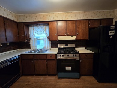 Located on a quiet street on Pontiac's South Side, this on The Links At Crystal Lake in Michigan - for sale on GolfHomes.com, golf home, golf lot