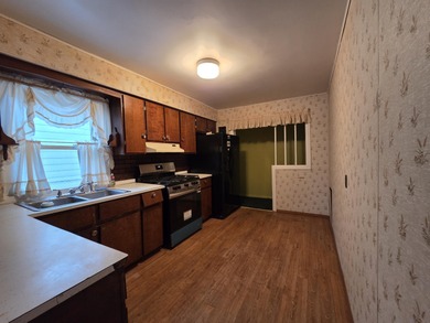 Located on a quiet street on Pontiac's South Side, this on The Links At Crystal Lake in Michigan - for sale on GolfHomes.com, golf home, golf lot