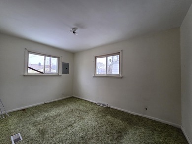 Located on a quiet street on Pontiac's South Side, this on The Links At Crystal Lake in Michigan - for sale on GolfHomes.com, golf home, golf lot