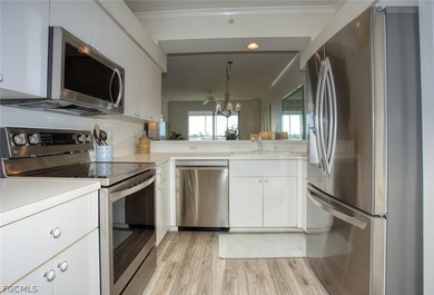 This bright, south-facing condo is filled with natural light on Heritage Palms Golf and Country Club in Florida - for sale on GolfHomes.com, golf home, golf lot