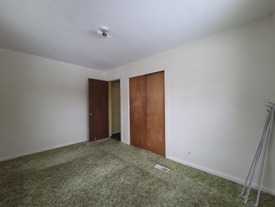 Located on a quiet street on Pontiac's South Side, this on The Links At Crystal Lake in Michigan - for sale on GolfHomes.com, golf home, golf lot