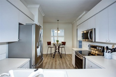 This bright, south-facing condo is filled with natural light on Heritage Palms Golf and Country Club in Florida - for sale on GolfHomes.com, golf home, golf lot