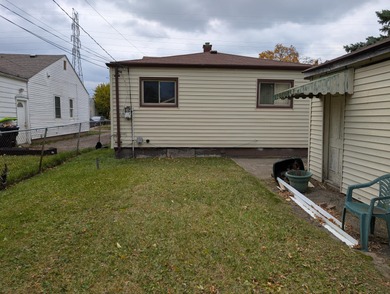 Located on a quiet street on Pontiac's South Side, this on The Links At Crystal Lake in Michigan - for sale on GolfHomes.com, golf home, golf lot