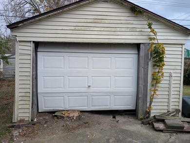Located on a quiet street on Pontiac's South Side, this on The Links At Crystal Lake in Michigan - for sale on GolfHomes.com, golf home, golf lot