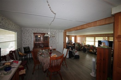Wonderful and well-maintained mobile home with 3 bedrooms/1.5 on Betmar Acres Golf Club in Florida - for sale on GolfHomes.com, golf home, golf lot