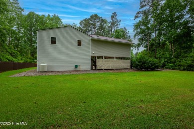 Discover your ideal rural peaceful retreat right in time for on Minnesott Golf and Country Club in North Carolina - for sale on GolfHomes.com, golf home, golf lot