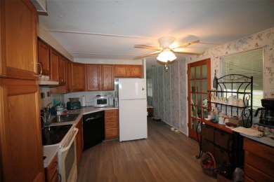 Wonderful and well-maintained mobile home with 3 bedrooms/1.5 on Betmar Acres Golf Club in Florida - for sale on GolfHomes.com, golf home, golf lot