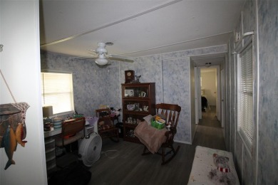 Wonderful and well-maintained mobile home with 3 bedrooms/1.5 on Betmar Acres Golf Club in Florida - for sale on GolfHomes.com, golf home, golf lot