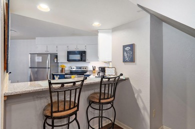 Spacious 4-bedroom, 3-bath condo offering comfort, flexibility on Pointe Royale Village Country Club in Missouri - for sale on GolfHomes.com, golf home, golf lot