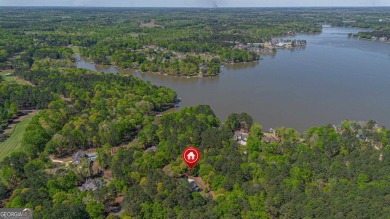 Welcome to this warm and comfortable home located in Great on Great Waters Course At Reynolds Plantation in Georgia - for sale on GolfHomes.com, golf home, golf lot