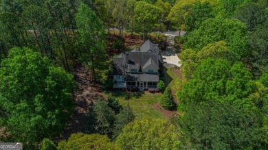 Welcome to this warm and comfortable home located in Great on Great Waters Course At Reynolds Plantation in Georgia - for sale on GolfHomes.com, golf home, golf lot