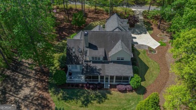 Welcome to this warm and comfortable home located in Great on Great Waters Course At Reynolds Plantation in Georgia - for sale on GolfHomes.com, golf home, golf lot