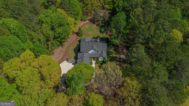 Welcome to this warm and comfortable home located in Great on Great Waters Course At Reynolds Plantation in Georgia - for sale on GolfHomes.com, golf home, golf lot