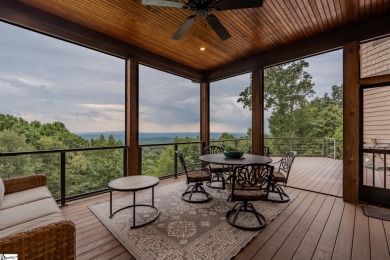 Perched atop a private 4.13-acre peak within the prestigious on The Cliffs at Glassy Golf and Country Club in South Carolina - for sale on GolfHomes.com, golf home, golf lot