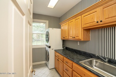 Waterfront Living with Unmatched Views - Wake up to breathtaking on Lockwood Folly Country Club in North Carolina - for sale on GolfHomes.com, golf home, golf lot