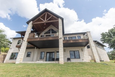 Step into a masterpiece of Hill County Modern home design on Slick Rock Golf Course - Horseshoe Bay in Texas - for sale on GolfHomes.com, golf home, golf lot