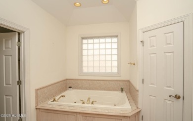 Waterfront Living with Unmatched Views - Wake up to breathtaking on Lockwood Folly Country Club in North Carolina - for sale on GolfHomes.com, golf home, golf lot