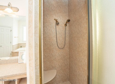 Waterfront Living with Unmatched Views - Wake up to breathtaking on Lockwood Folly Country Club in North Carolina - for sale on GolfHomes.com, golf home, golf lot