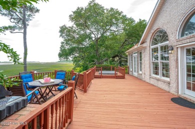 Waterfront Living with Unmatched Views - Wake up to breathtaking on Lockwood Folly Country Club in North Carolina - for sale on GolfHomes.com, golf home, golf lot
