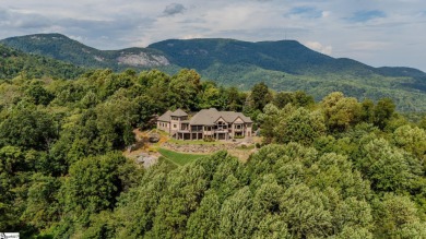 Perched atop a private 4.13-acre peak within the prestigious on The Cliffs at Glassy Golf and Country Club in South Carolina - for sale on GolfHomes.com, golf home, golf lot
