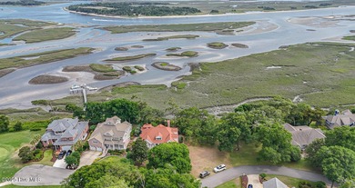 Waterfront Living with Unmatched Views - Wake up to breathtaking on Lockwood Folly Country Club in North Carolina - for sale on GolfHomes.com, golf home, golf lot