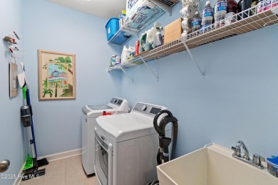 This 3 BR, 2.5 bathroom Osprey Ridge end unit condo in the on Sea Trail Golf Resort in North Carolina - for sale on GolfHomes.com, golf home, golf lot