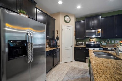 Welcome to 29405 Cochiti Lake Drive, located in the gated 55+ on Tampa Bay Golf and Country Club in Florida - for sale on GolfHomes.com, golf home, golf lot