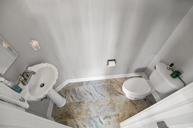 Elegant all-brick golf-front living with sweeping 9th-fairway on International Club of Myrtle Beach in South Carolina - for sale on GolfHomes.com, golf home, golf lot