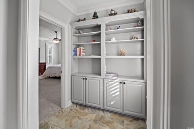 Elegant all-brick golf-front living with sweeping 9th-fairway on International Club of Myrtle Beach in South Carolina - for sale on GolfHomes.com, golf home, golf lot